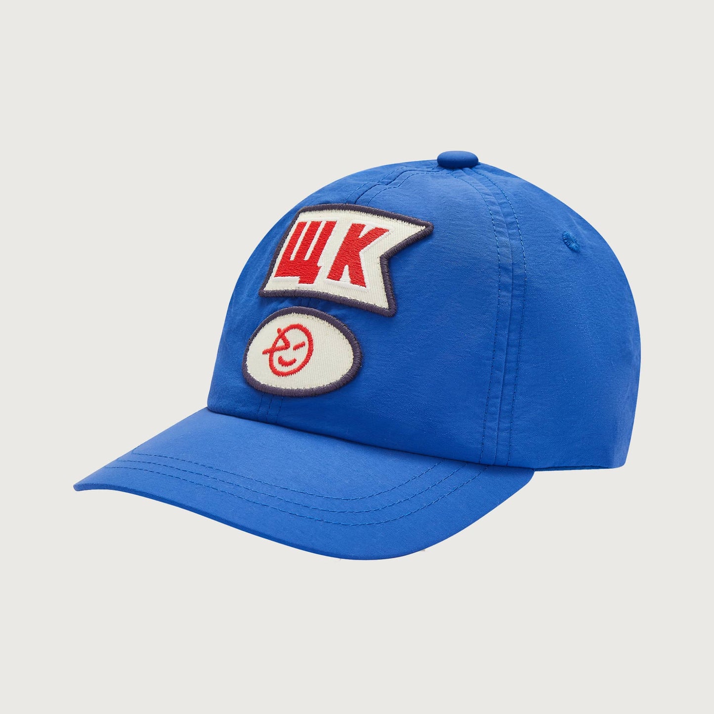 Wynken Nylon badge cap strong blue / 6-12Y