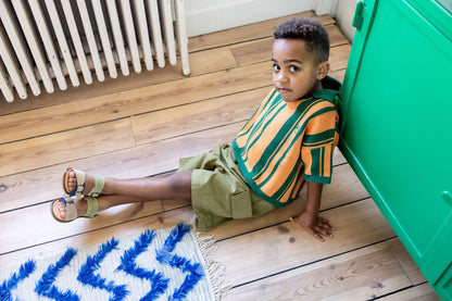 Main Story Short polo green peach knit