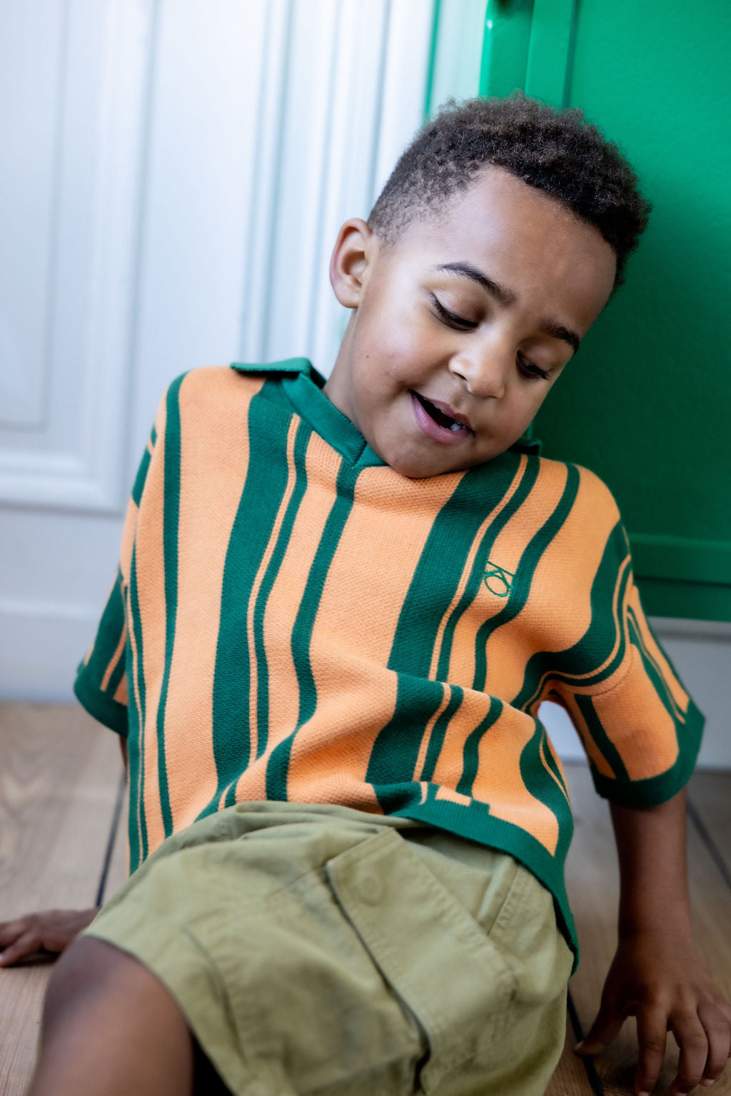 Main Story Short polo green peach knit