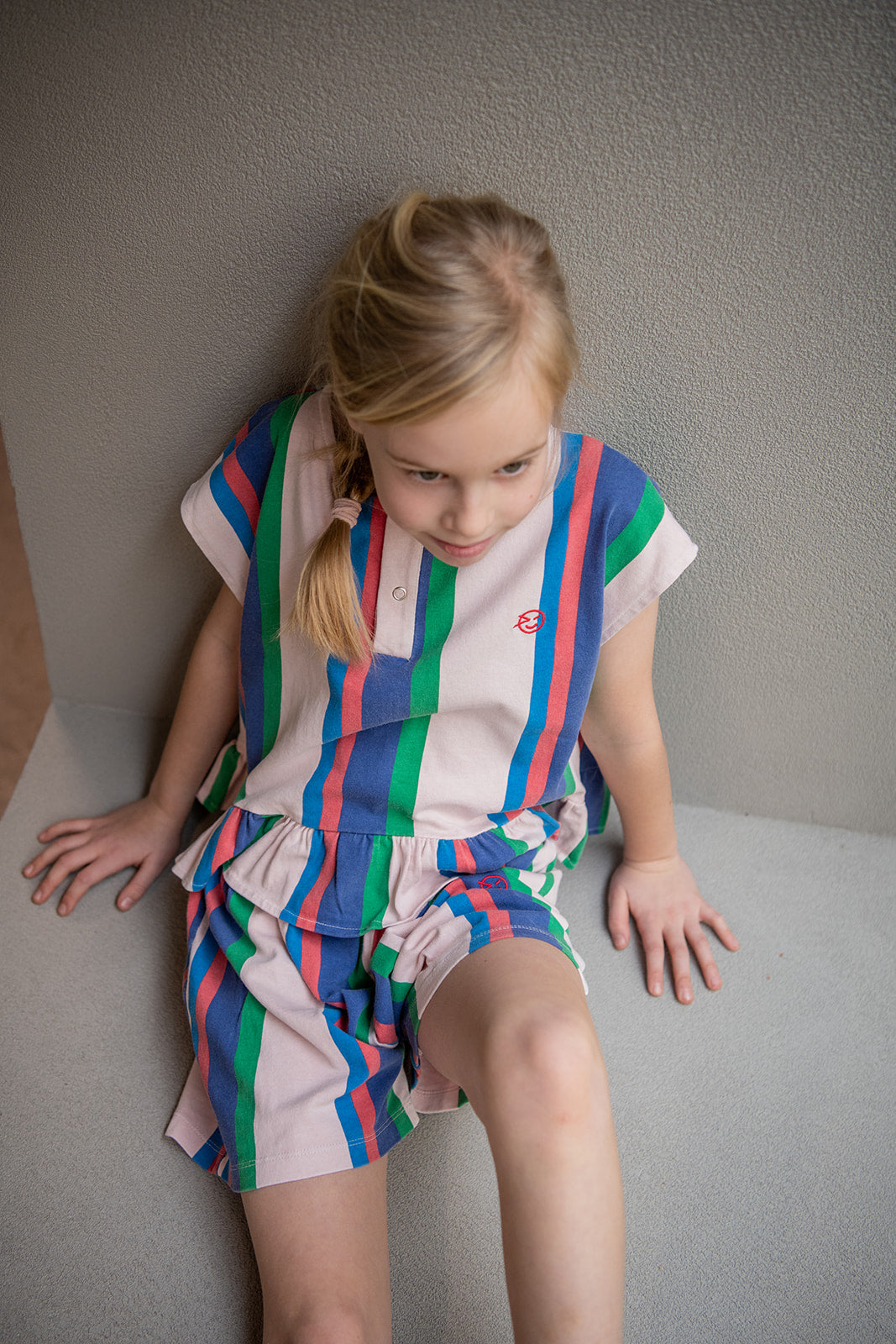 Wynken Vela frill top pink blue