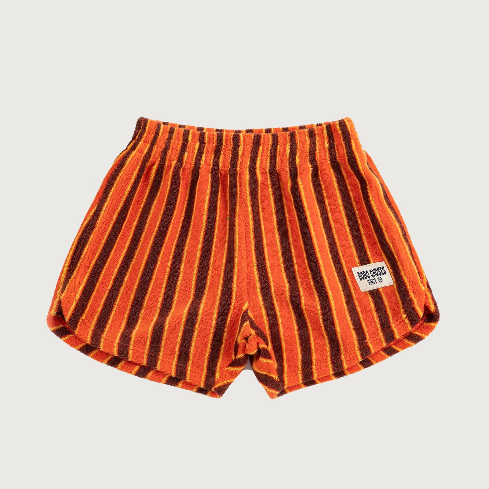Gestreepte short in badstof oranje bruin geel Bobo Choses