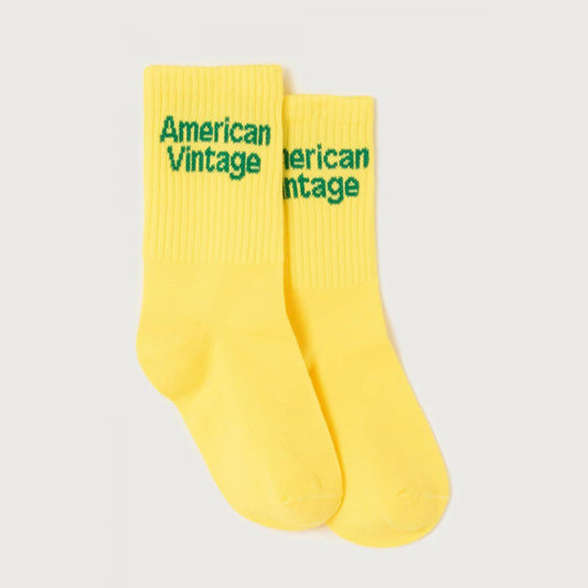 Gele sport kousen met groene letters van American Vintage Kids