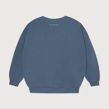 The Campamento FAMILY ON THE COUCH sweatshirt blue